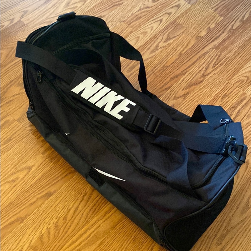 Nike Black Duffel Bag with Adjustable Straps and Durable Fabric